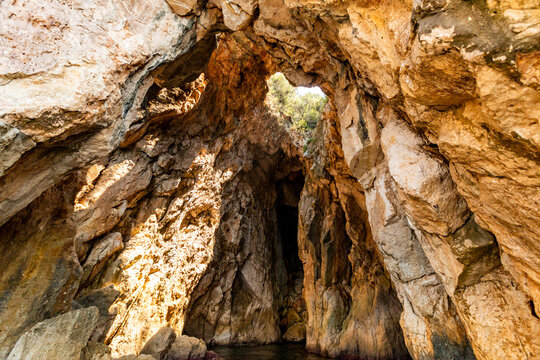 Rocky cliffs of Shpella e Pirateve tourist attraction, Albania