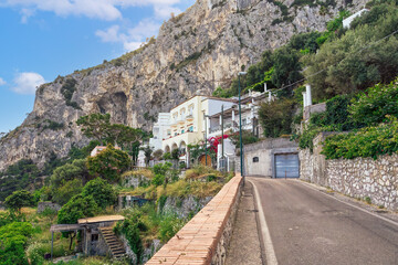 Houses surrounded by greenery above Marina Picola, Capri Island, Bay of Naples, Campania, Italy