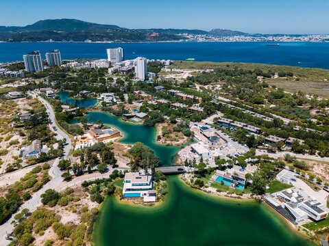 Aerial drone panoramic view of Troia, a peninsula located in Grandola Municipality, next to Sado River estuary, Alentejo, Portugal