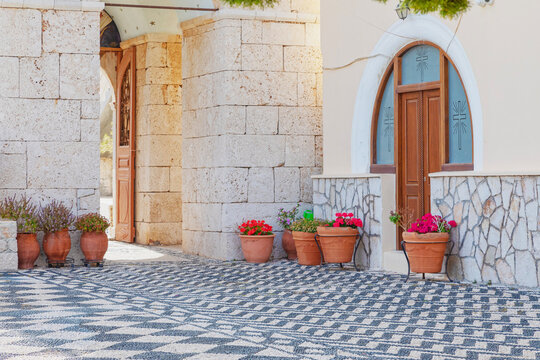 Pavement mosaics outside Saint Nicholas church, Halki Island, Dodecanese Islands, Greek Islands, Greece
