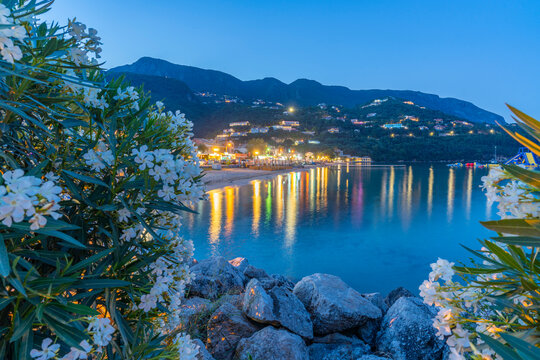 View of Ionian Sea and Ipsos Beach in Ipsos at dusk, Ipsos, Corfu, Ionian Sea, Greek Islands, Greece