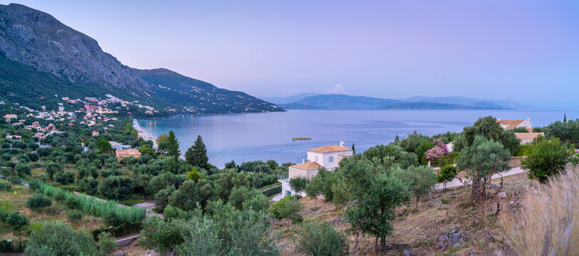 View of Ionian Sea and Paralia Mparmpati at dusk, Barbati, Corfu, Ionian Sea, Greek Islands, Greece