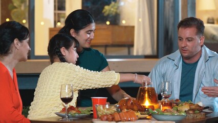Family gather celebrate holiday. Parents, grandparents and girl together to talk and have dinner party food. Outdoor activity for spending time with multigeneration cross generation gap. Divergence.