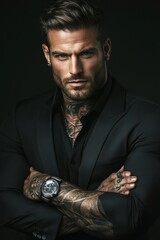 Photograph of a muscular man with a handsome face, confident posture, serious expression, wearing a black suit with the collar of his shirt open to reveal tattoos on his chest and arms, 