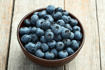 Blueberry photography in a bowl on rustic background