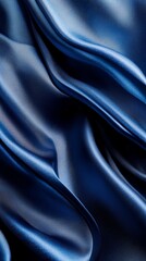 Fototapeta premium Close-up of dark blue satin fabric