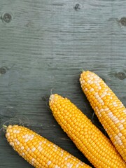 corn, licorice, cobs, on the table, seeds, summer, yellow, wooden background, top view, free space, copy space, taste, family, health, field, harvest, stalk, grain, drying, estate, farm, fodder, insur