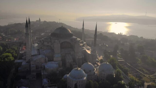 Aerial view of Hagia Sofia Mosque, Sunrise time, Istanbul historical center and Bosphorus in Istanbul, Turkey, Turkiye.