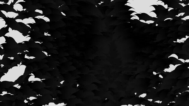 A large swarm of Halloween bats flying and filling the white screen