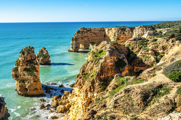 Praia da Marinha Beach among rock islets and cliffs seen from Seven Hanging Valleys Trail, Algarve, Portugal