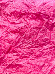 Pink crumpled paper background, backing, backdrop for creativity
