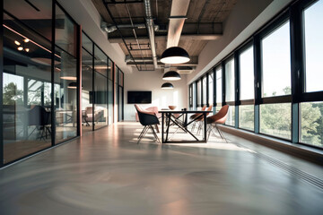 Contemporary office space with coarse concrete floors.