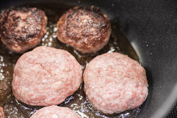Cooking cutlets. Homemade cutlets are fried in a cauldron.