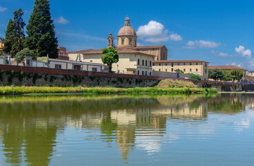 View of the architecture of the beautiful city of Florence in Italy from the Arno River