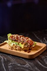 Enjoy a Delicious Lettuce Wrap with Tasty Toppings and Sauce, Perfect for Any Meal