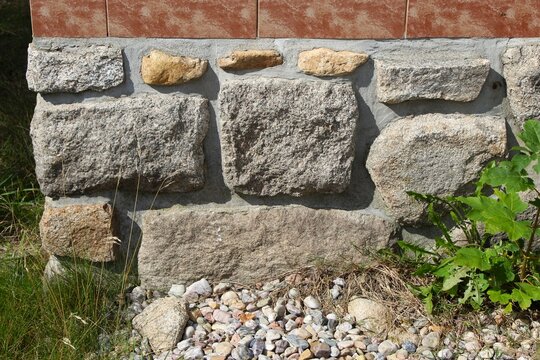 Stone underpinning. Wall base.