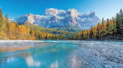   A river runs through a lush green forest, surrounded by towering mountains and countless trees