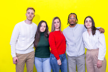 Young diverse team standing together