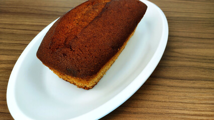 Cinnamon cake on the wooden tabe with copy space
