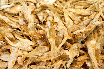 A large assortment of dried fish is on display in the Asian store.