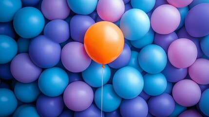 A single orange balloon standing out among a sea of blue and purple balloons, representing individuality, uniqueness, and the courage to be different and stand out in DEI hiring