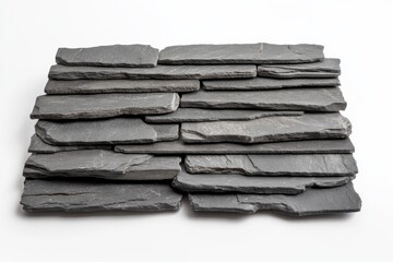 Neatly arranged weathered gray slate tiles showcase their textured surfaces and varying shapes in a stylish offset pattern