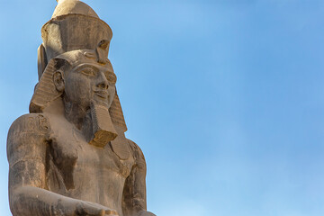 The colossal statue of Ramses II dominates the temple of Luxor, testimony to the power of the...