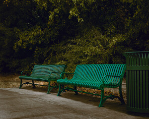 Obraz premium Empty green metal park benches