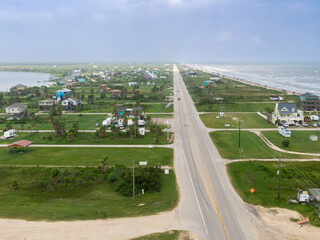 Holiday homes along the coast on the  Bolivar Peninsula, in the Gulf of Mexico, Texas, United States.