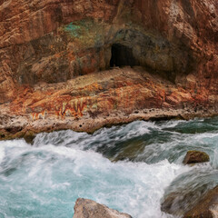 Abandoned artisanal gold mine in a rocky Andean landscape