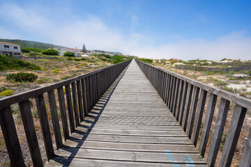 Fototapeta premium Wooden walkways next to Obidos Lagoon beach