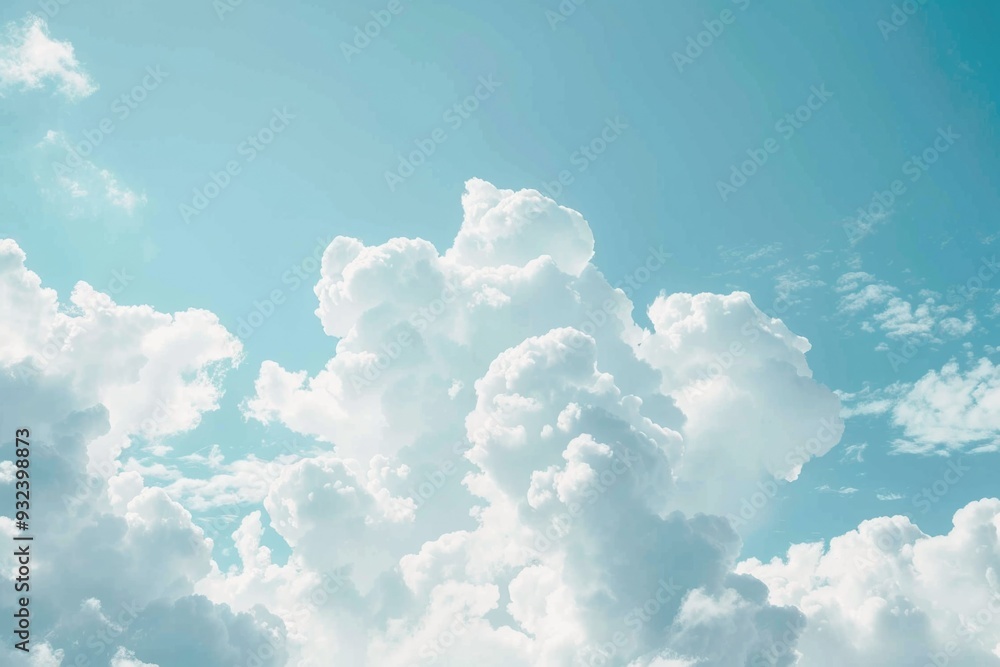 Poster a plane soaring through a cloudy blue sky with some fluffy white clouds