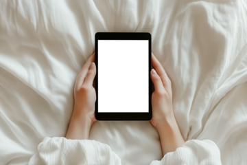 Female hands holding a black tablet with a transparent screen. PNG file.