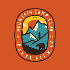 Vintage camping logo badge featuring wilderness-themed design including mountains landscape and bear. Stock travel label