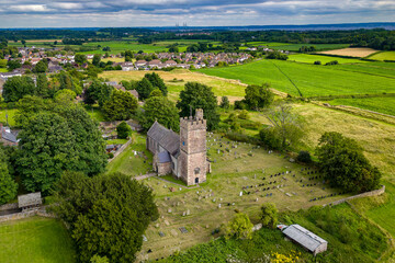 Aerial view of the ancient 13th century church inside the Roman walls of the ancient town of...