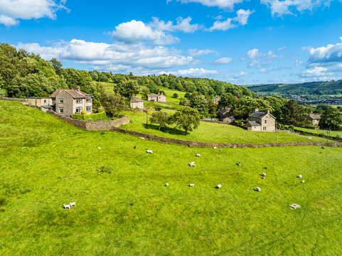 Farms and Fields over Cononley and River Aire from a drone, Keighley, North Yorkshire, England