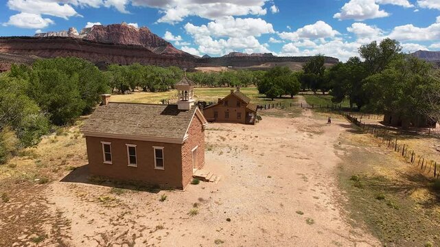 Aerial Grafton pioneer ghost town church to home Utah. Outside of Zion National Park in Utah. Settled in 1859 by Mormon pioneers. Homes and church school. Virgin river. Historic.