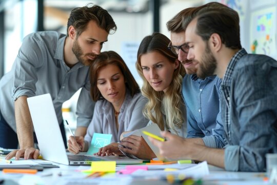 Group of professionals in office, engaged in collaborative brainstorming