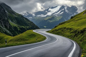 Fototapeta premium Panoramic view of grossglockner alpine road serpentine winding path through majestic alps