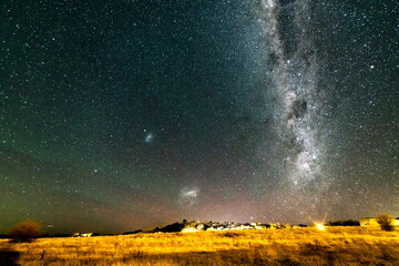 Stargazing at the night sky and milky way with a hint of the Southern Lights (Aurora Australis)