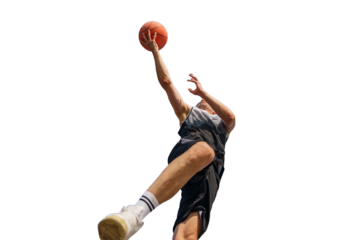 A basketball player leaps into the air, arm outstretched, preparing for a powerful slam dunk.

