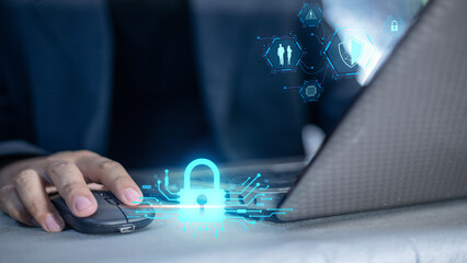 A person is using a computer mouse to click on a blue lock icon on a laptop