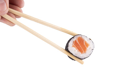Holding piece of urumaki sushi roll with chopsticks isolated © mario