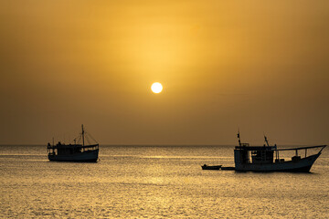 Obraz premium Fishing boat in Juan Griego Bay at sunset. Margarita Island, Nueva Esparta State. Venezuela.