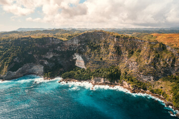Drone view panorama of seaside cliffs in Bali, Indonesia