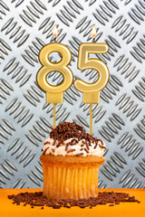 Birthday candle number 85 - Industrial metallic background.