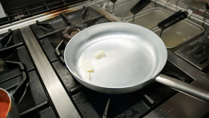 Butter Melting Inside A Frying Pan 