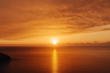 Obraz premium Sunset Over the Sea with Orange Sky and Horizon View from Above, Serene Seascape