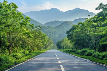Mountain landscape in Hangzhou with green forest and asphalt road