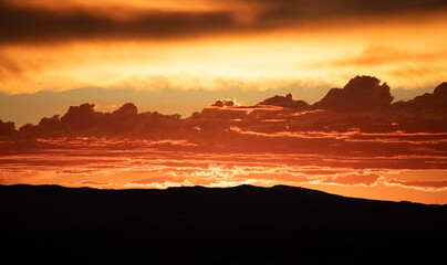 Dramatic orange sunset with incredible clouds